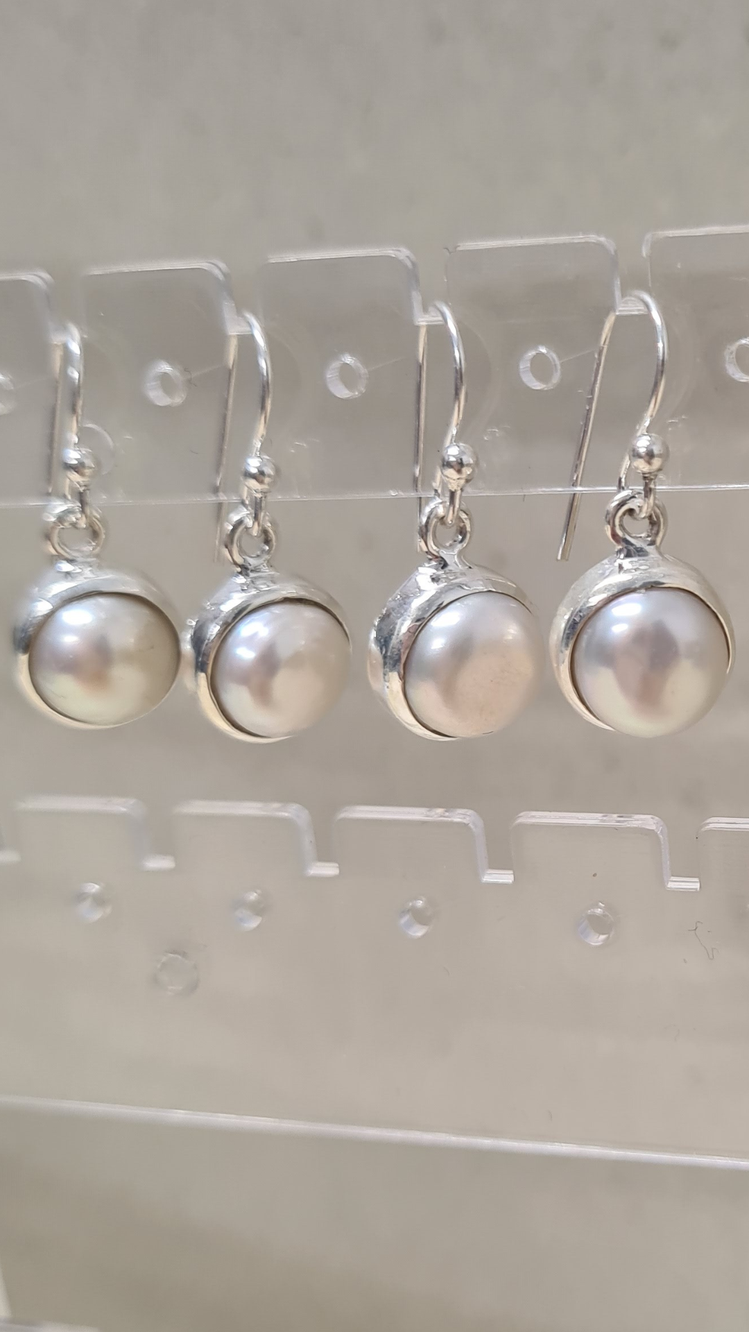 Freshwater pearl dangle earring encased in sterling silver (B)