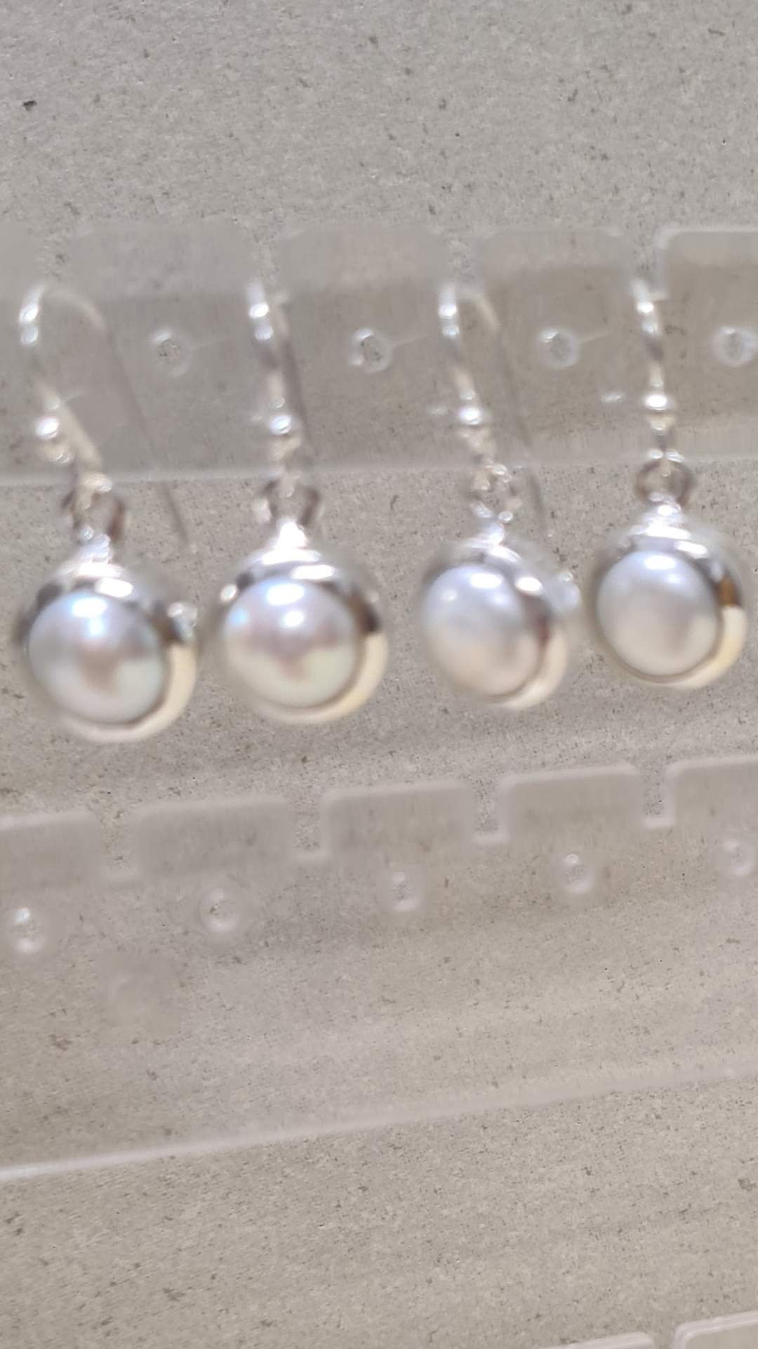 Freshwater pearl dangle earring encased in sterling silver (C)